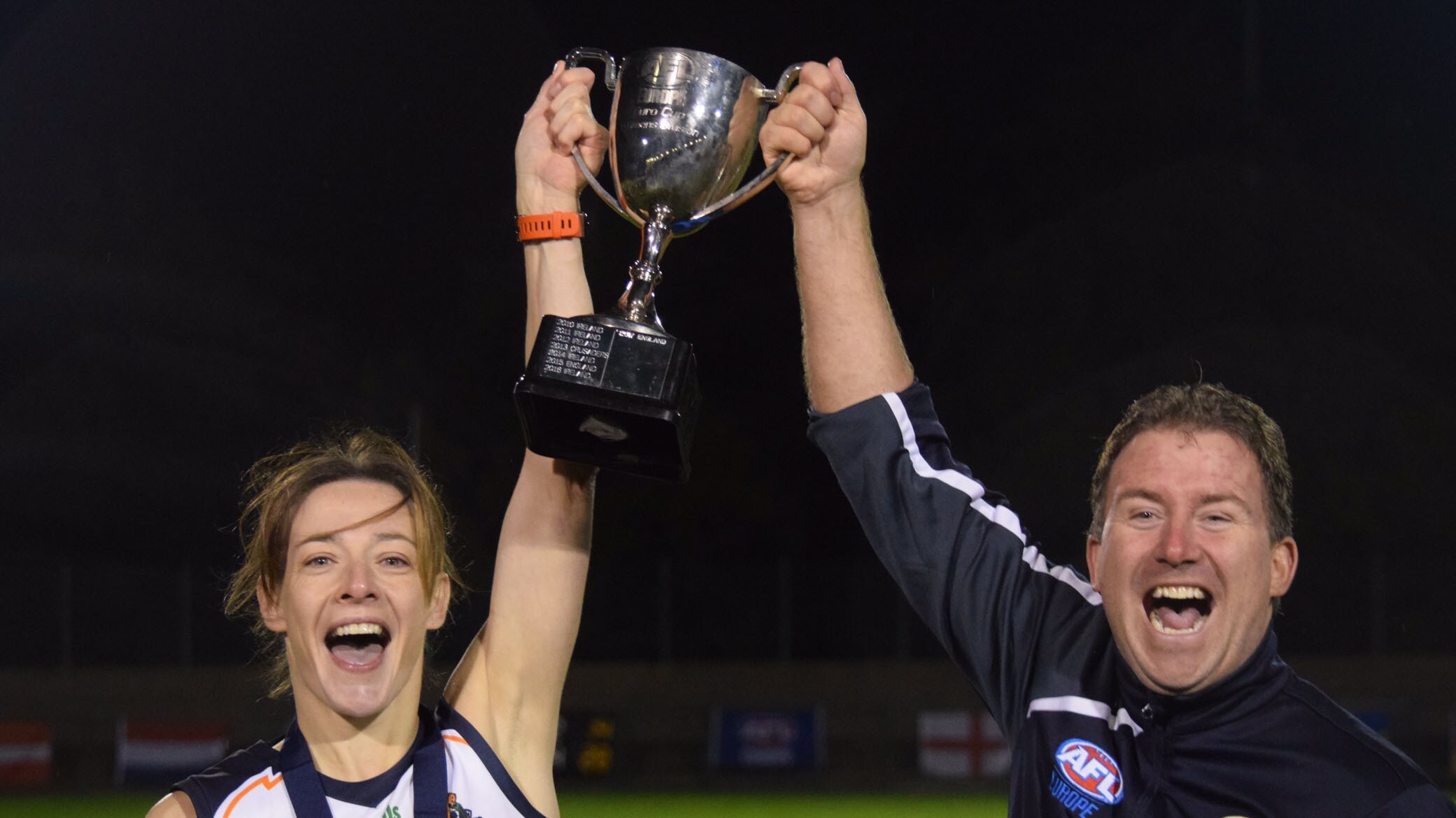 EuroCup300x300.jpg Mella Morey and Mike Currane celebrate the Irish Banshees' win in the Euro Cup - AFLW
